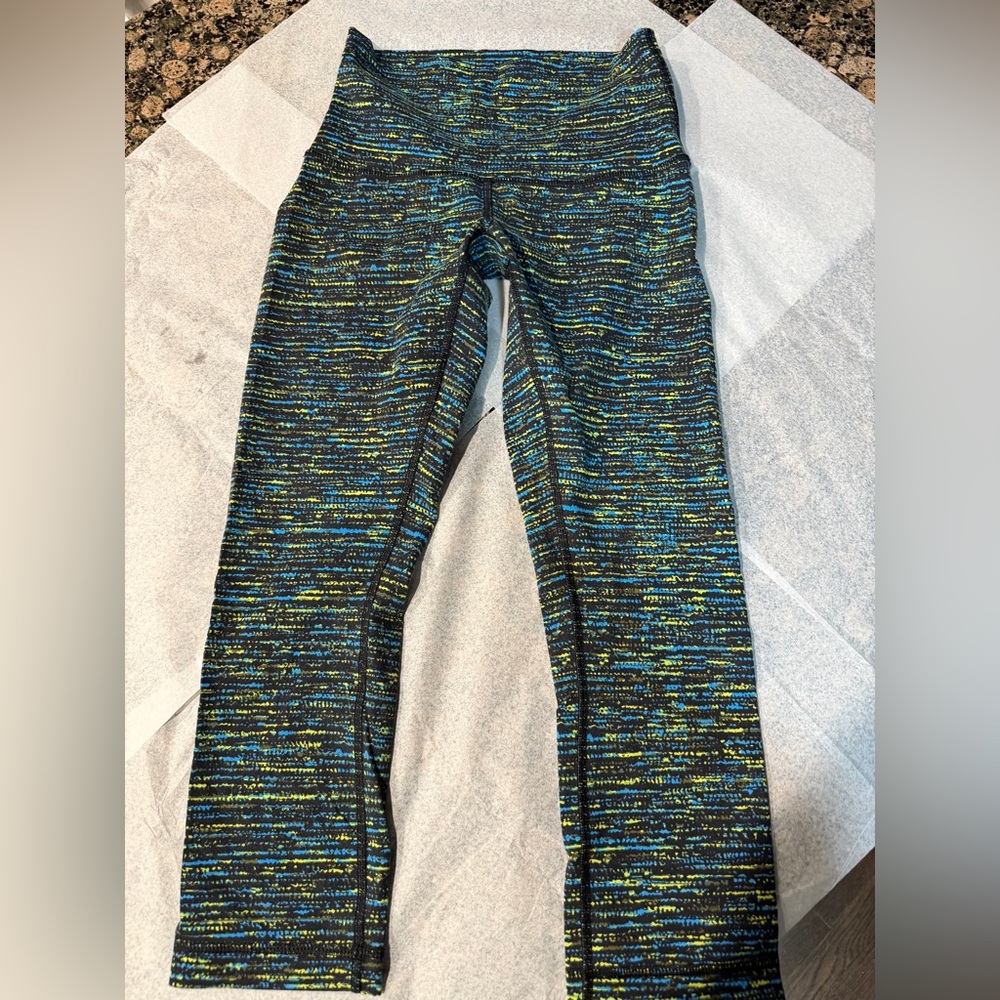 lululemon athletica Black with Blue & Neon Yellow Speckled High-Rise leggings.